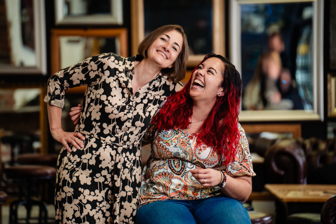 2 women smiling